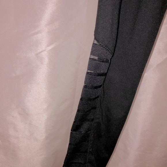 This is a black pair of pants. - Picture 4 of 13